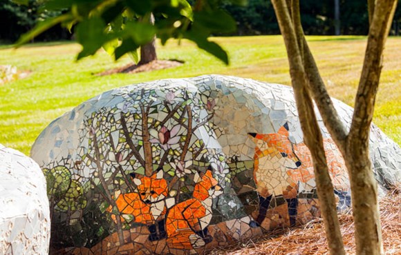 Fox mosaic embedded in stone
