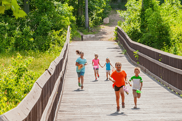 Kids Running on Bridge.png