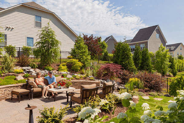 couple enjoying backyard garden