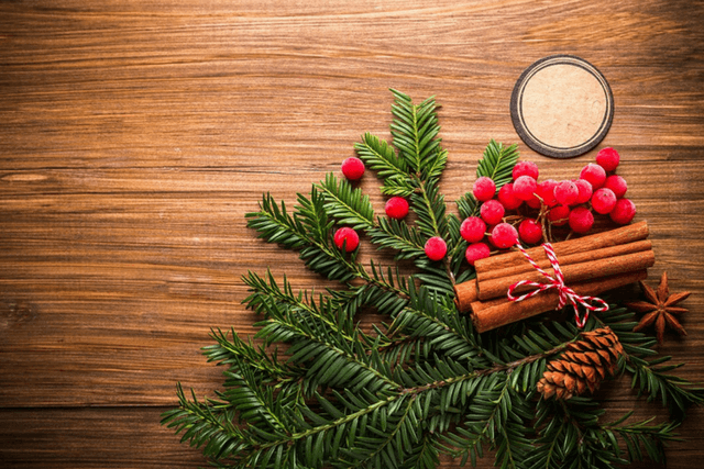 holiday decor with pine and candles