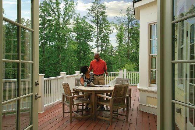 couple enjoying time on back porch