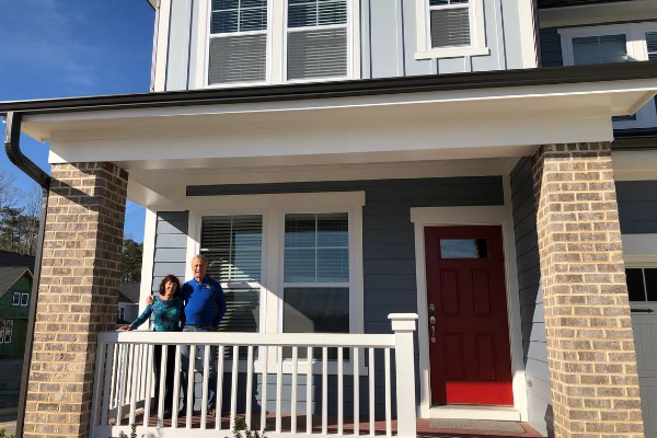 Briar Chapel residents, The Lacey's, on their front porch.