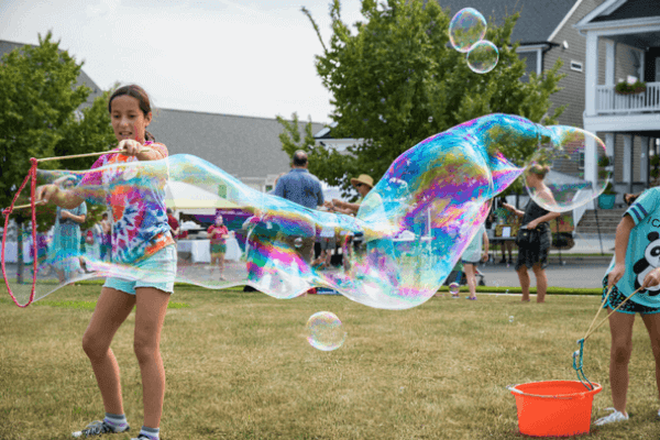 kids blowing bubbles