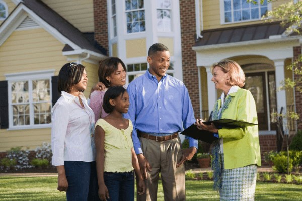 Family with real estate agent