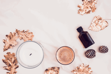 bottles of scents and candles