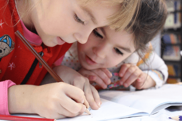 kids drawing on paper