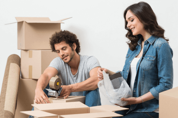 Couple with moving boxes