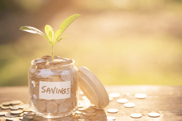 jar of coins labeled savings