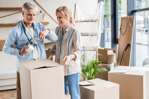 Couple with moving boxes