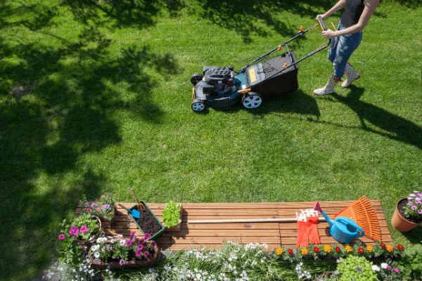 person mowing the yard