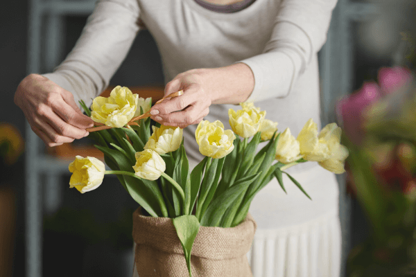 vase of yellow flowers