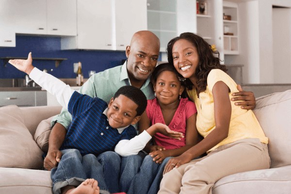 Family together on couch