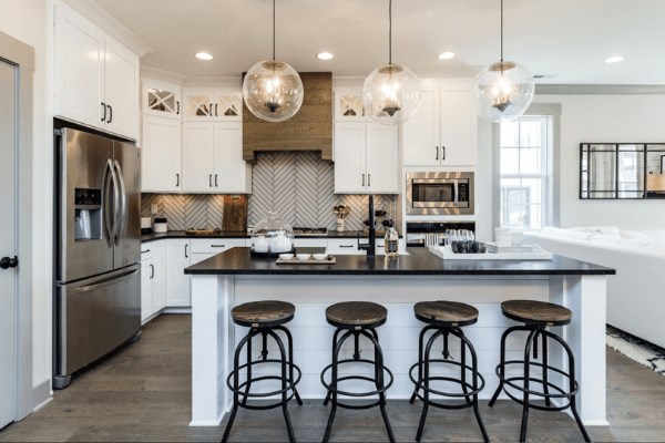 Open kitchen with island and bar area.