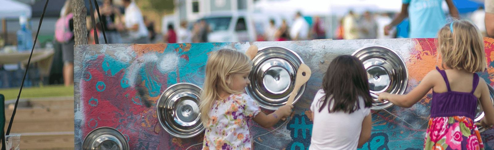 kids playing at outdoor music festival in Briar Chapel