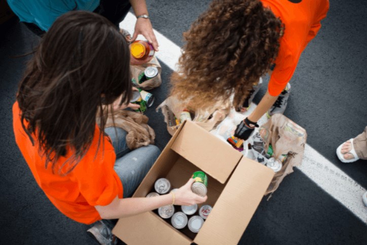 Women packing boxes at food bank